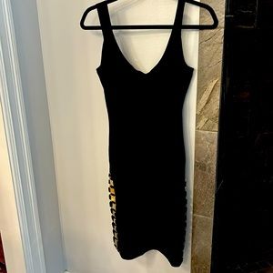 Herve Leger black dress w gold details on both sides